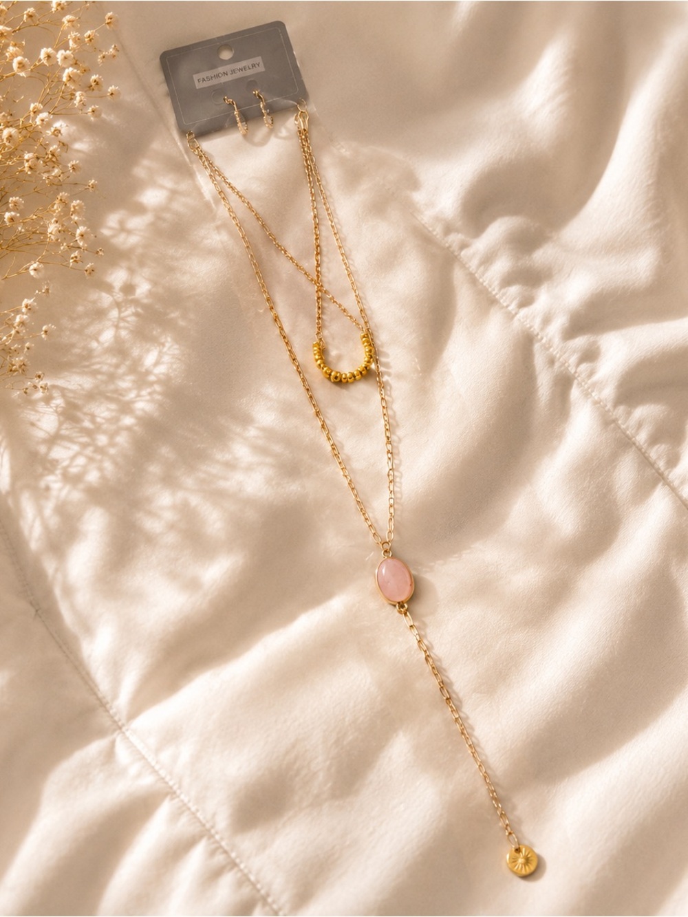 Charming Charlie Rose Gold Necklace with Pink Stone